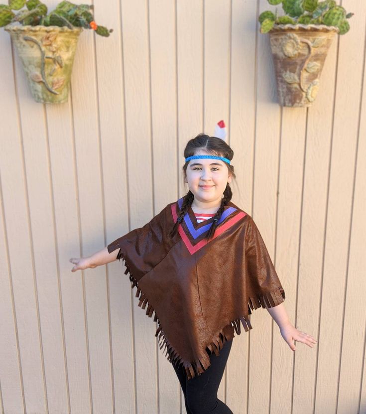 Girls Tiger Lilly costume, girls costume, Indian poncho costume, Native American costume, girls Indian costume Handmade tiger lily costume. Poncho is child sized and best suited for kids 5 to 8. You will get the poncho, headband and feather clip.  The costume will ship USPS ground advantage, with insurance and tracking.  U.S. shipping is generally 3-5 business days, but it can take up to a week. Contact me if you have a specific date you would need it by and I will see if it can be accommodated. Please contact me if you have any question or would like additional photos.  Thanks for looking!  Check out the other items in my shop! * Contact me if you need a smaller/larger size. For a custom order I will need the measurement from shoulder to wrist. Tiger Lilly Costume, Tiger Lily Costume, Lily Costume, Poncho Costume, American Costume, Tiger Lily, Costume Halloween, Girl Costumes, American History