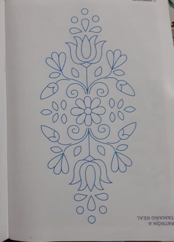 an open book with a drawing on it's cover and the title written in blue ink