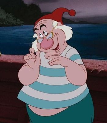 an animated character wearing a santa hat and striped shirt, standing on a deck near the ocean