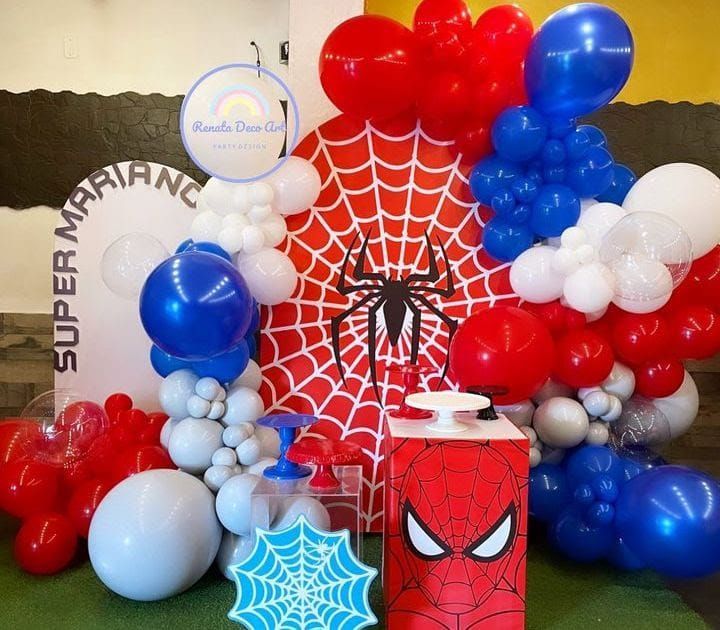 a spiderman themed birthday party with balloons