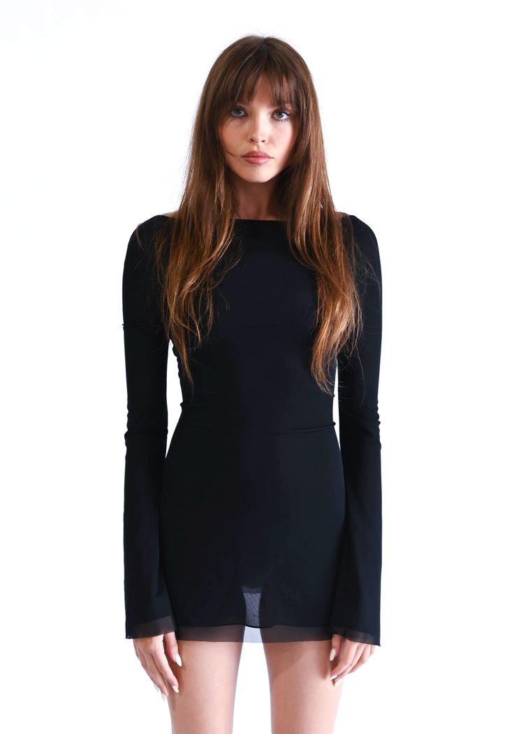 The Jane Mini Dress is an ode to the 70's. With the signature flared sleeves and flattering low back, this dress will make the perfect staple mini to add to your wardrobe. Its stretchy mesh fabric and mini length will make the perfect dress for any flirty occasion. Slip on mini-dress Double lined Fitted cut, slightly sheer stretch mesh fabric Extended length flared sleeves Low scoop back 100% Recycled Polyester (96% Polyester 4% Elastane) Made from ocean bound plastic bottles driven from post-co 90s Inspired Fashion, Luxury Clothing Brands, Technology Fashion, Jane Dress, Black Dresses Casual, Casual Black, Celebrity Entertainment, Fall Wardrobe, Low Back