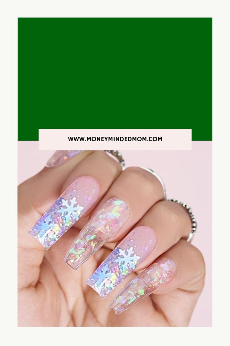 Close-up of a hand with long, glittery nails featuring snowflake designs. Red And Green Nails, Christmas Savings Plan, Winter Nail Art Ideas, Diamond Nail Designs, Christmas Nail Ideas, Frugal Christmas, Rudolph Christmas, Peppermint Christmas, Christmas Savings