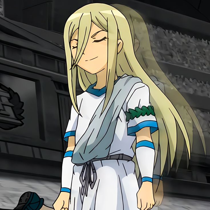 an anime character with long blonde hair standing in front of a stadium looking at something