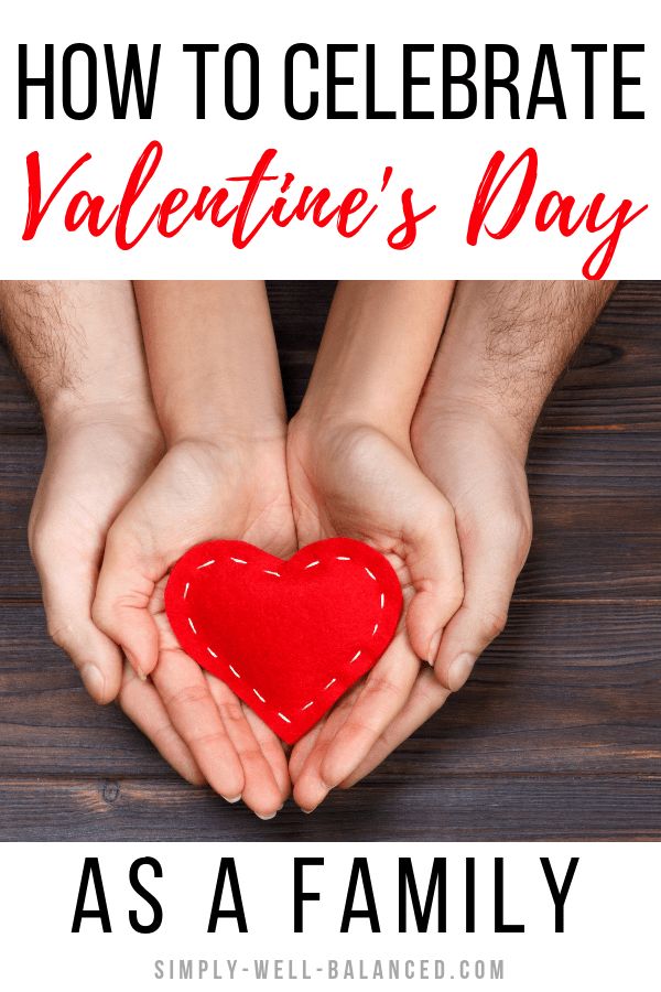 two hands holding a red heart with the words how to celebrate valentine's day as a family