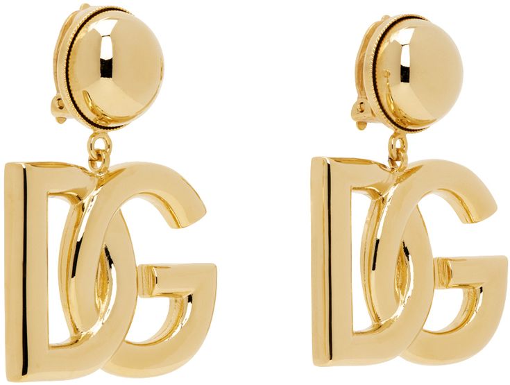 Pair of drop earrings in gold-tone brass. �· Logo hardware at drop · Clip-on fastening · H2 x W1.5 Supplier color: Gold Luxury Gold-tone Jewelry With Logo Lettering, Designer Yellow Gold Jewelry With Logo Lettering, Formal Yellow Gold Jewelry With Gold-tone Logo Lettering, Designer Gold Brass Jewelry, Designer Gold Jewelry With Gold-tone Hardware, Designer Gold-tone Brass Jewelry, Designer Gold-tone Clip-on Earrings, Designer Yellow Gold Jewelry With Gold-tone Hardware, Luxury Gold-tone Earrings With Logo Plaque