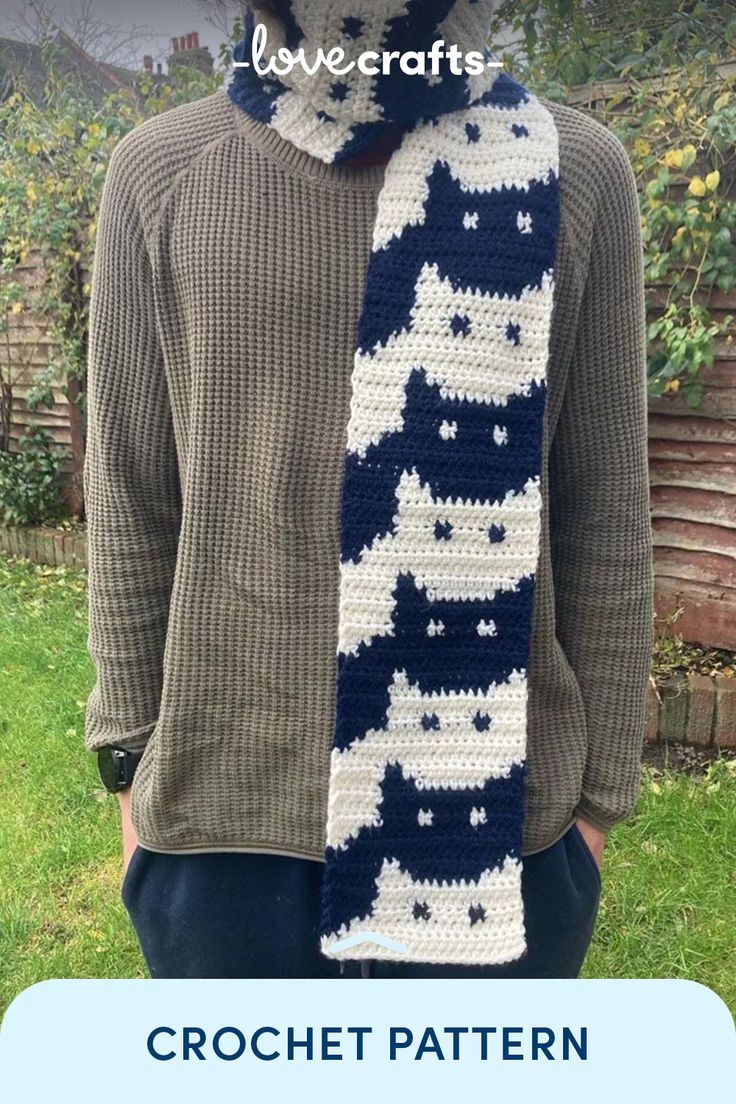 a man wearing a crochet scarf with the words lovecrafts written on it