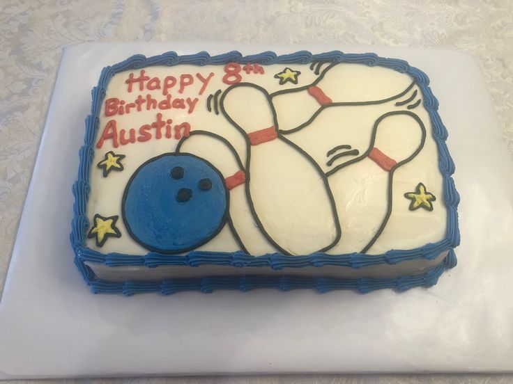 a birthday cake with a bowling ball and pins on the side that says happy 8 th birthday austi