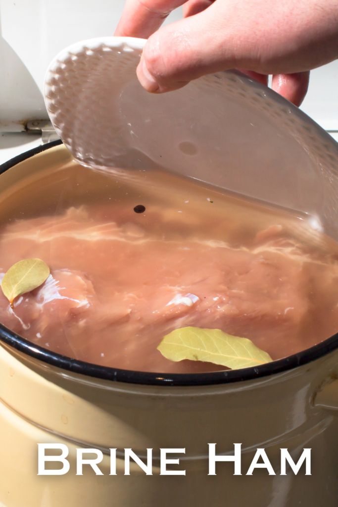 a person is pouring liquid into a pot