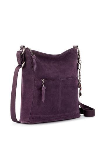 With room for all your essentials and then some, the Lucia Crossbody keeps you organized on the go. Zip and slip pockets inside and out ensure your belongings are securely stowed yet easily accessible, while the adjustable webbing strap lets you go hands free. Main zipper closure Interior contains a back wall zipper pocket and two front wall multi-functional pockets Adjustable crossbody strap PETA-approved, Vegan Certified, REPREVE lining made from recycled materials including plastic bottles Front Wall, Webbing Strap, The Sak, Peta, Plastic Bottles, Crossbody Strap, Hands Free, Recycled Materials, Inside Pocket