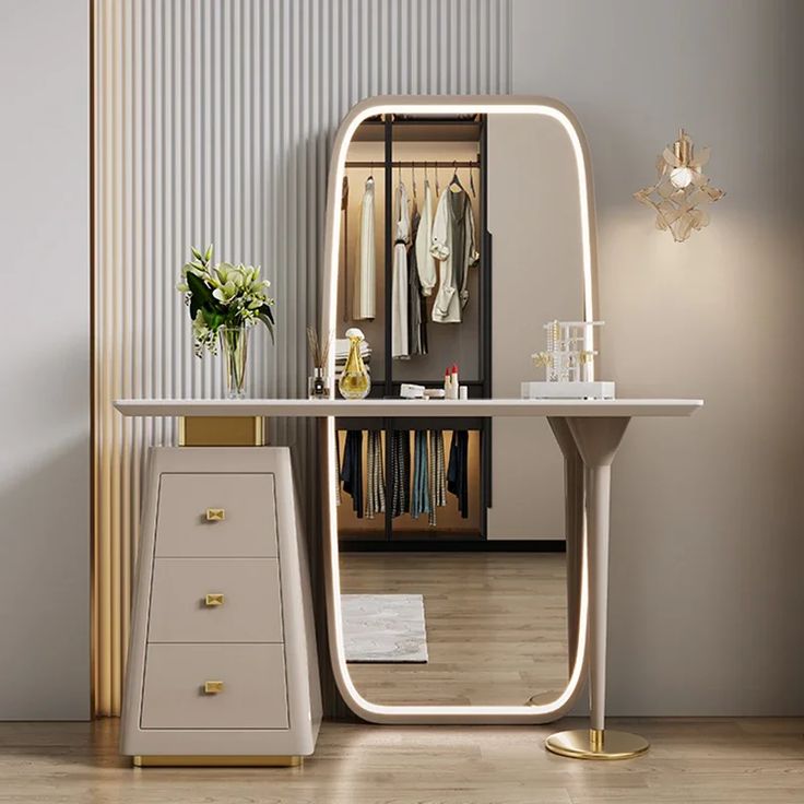 a dressing room with a mirror, dresser and drawers in white color on wooden flooring