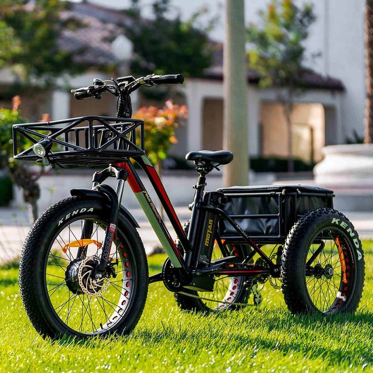 an electric bike parked in the grass