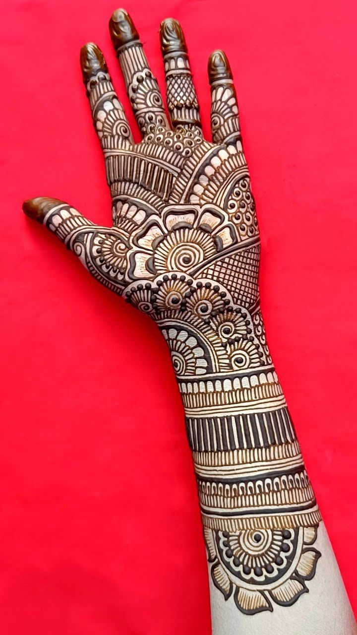 a henna tattoo on someone's hand