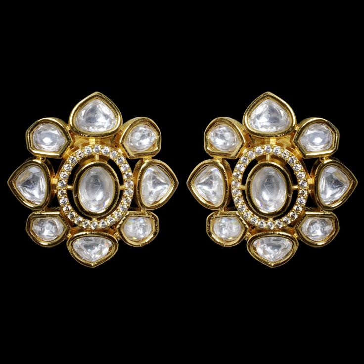 Kundan Studs or Polki Earrings showcase the intricate craftsmanship and timeless beauty of Indian jewelry. Moissanite Polki Stud Earrings an India Kundan Stud Earrings offer a modern twist to traditional designs. Uncut Polki Jewelry and Jadau Earrings exude opulence and sophistication. Polki Diamond Studs add a touch of glamour. Complete your ensemble with these captivating designs for a look that celebrates the rich heritage of Indian adornments and adds a stylish and elegant touch to any occas Kundan Earrings Studs, Kundan Studs Earrings, Polki Studs, Jadau Earrings, Kundan Studs, Sabyasachi Jewelry, Pakistani Earrings, Star Bangle, Kundan Jewellery Set