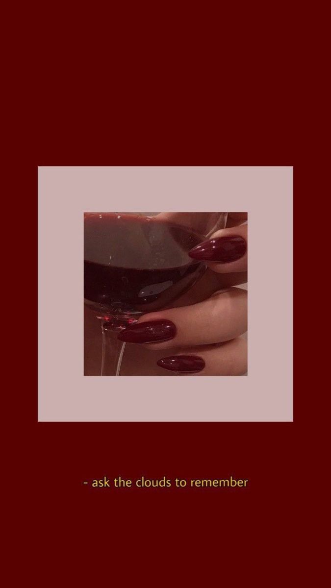 a woman's hand holding a glass of wine with the caption ask the clouds to remember