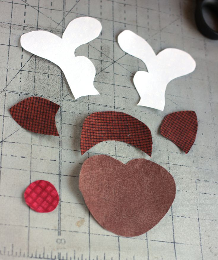 some paper cut out to look like reindeers