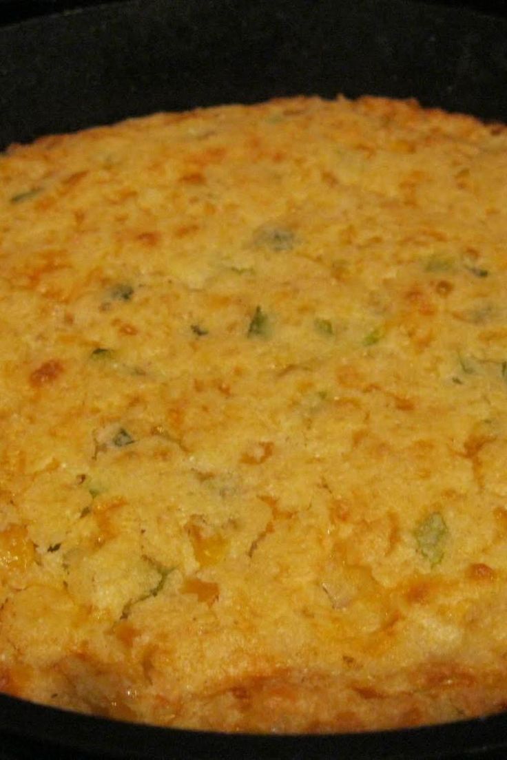 a close up of food in a pan on a stove