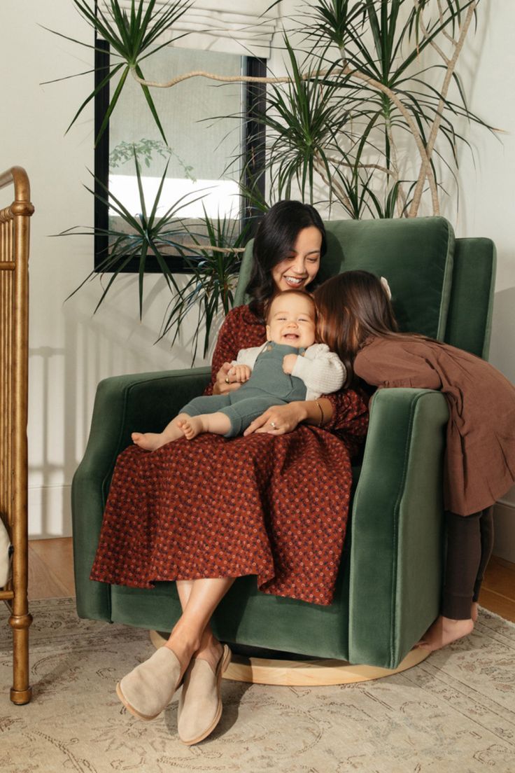 woman baby and child on forest green recliner smiling Green Rocking Chair, Green Velvet Sofa Living Room, Reclining Rocking Chair, Nursery Glider Rocker, Nursery Recliner, Brown Leather Recliner, Nursery Rocker, Green Velvet Chair, Swivel Recliner Chairs