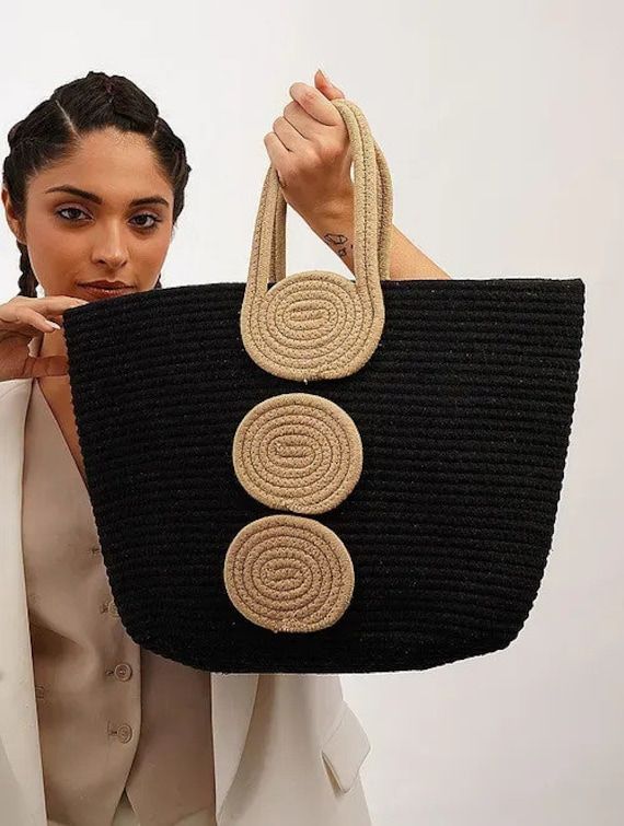 Handmade Jute tote bag designed for everyday use. This shoulder bag is perfect to keep all your essentials close. The design is stylish that will complement any casual or formal outfit even.  It can complete any casual outfit and make you feel comforable on a long demanding day. This is one of a kind handcrafted bag which is handcrafted to order. As it is a handcrafted product, it may have slight irregularities or imperfections.  Material: Jute Measurements Length - 35.56cm Width - 48.26cm Handle - 12.70cm Modern Crochet Tote Bag For Shopping, Trendy Natural Canvas Shoulder Bag, Casual Jute Bag With Large Capacity, Casual Jute Shoulder Bag For Daily Use, Casual Tote Beach Bag For Shopping, Casual Daily Use Jute Shoulder Bag, Trendy Jute Beach Bag For Everyday Use, Casual Jute Beach Bag For Shopping, Casual Canvas Straw Bag For Daily Use