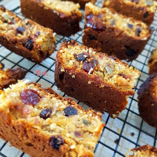 there are many pieces of cake on the cooling rack