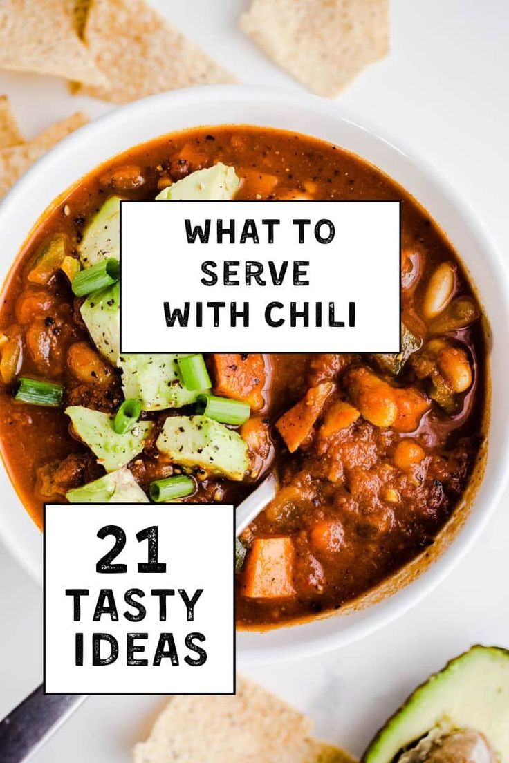 what to serve with chili in a white bowl next to avocado and crackers