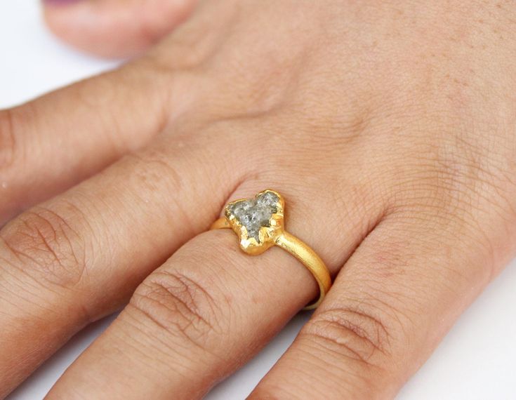 Raw Diamond ring, Raw gemstone engagement ring, 14k gold Filled Ring, Rough diamond, Natural Diamond ring, Rough Diamond ring, Organic Ring A symbol of purity, It brings love and clarity into partnerships, bonding relationships. Diamond is a sign of commitment and fidelity, and instills trust to relationships and situations. Diamond is an energy amplifier. It is a stone that never requires recharging. 100 Percent Natural Raw Diamond ✦Gemstone: Natural Raw Diamond ✦Diamond Weight Approx 1.5 Carat Trillion Cut Solitaire Diamond Ring As Gift, Anniversary Gold Emerald Ring With Single Cut Diamonds, Emerald Promise Ring With Single Cut Diamonds, Heart Cut Diamond Ring With Rose Cut For Promise, Round Emerald Ring With Single Cut Diamonds For Promise, Trillion Cut Diamond Ring With Prong Setting As Gift, Gold Trillion Cut Diamond Ring As Gift, Trillion Cut Solitaire Diamond Ring For Gift, Heart Cut Single Diamond Rings For Anniversary