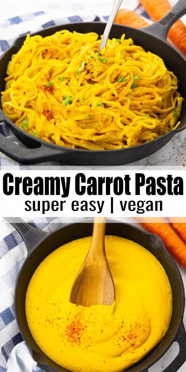 creamy carrot pasta in a cast iron skillet with a wooden spoon on the side