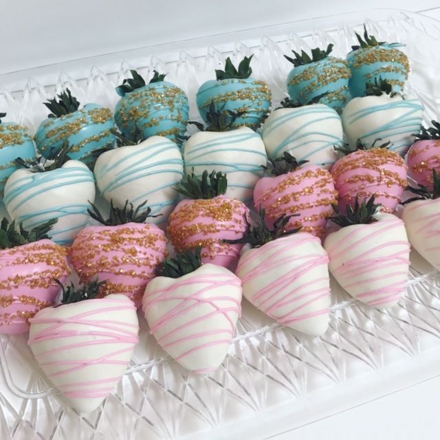 chocolate covered strawberries are arranged on a platter