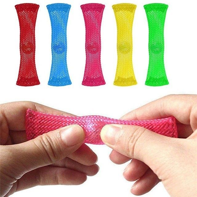 a person holding an item in their hand with different colors on it and the other one is