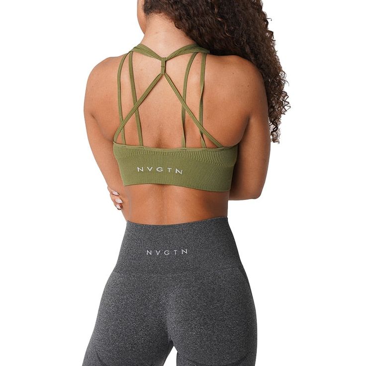 Take your workouts to the next level, or even better yet, out of this world in our Galaxy Ribbed Seamless Bra. This bra is crafted with buttery soft ribbed seamless material that features intricate back detailing and removable padding. The support is low-medium, but the comfort level is high and will soon become a wardrobe essential. Pair this with any of our seamless leggings to complete the look. High Stretch Seamless Yoga Bra, Workout High Stretch Seamless Bra, High Stretch Seamless Workout Bra, High Stretch Seamless Gym Bra, Workout Bra With High Stretch Seamless Fabric, Fitted Seamless Nylon Sports Bra, Compressive Ribbed Sports Bra, Fitted Nylon Sports Bra With Seamless Design, Ribbed Racerback Sports Bra For Workout