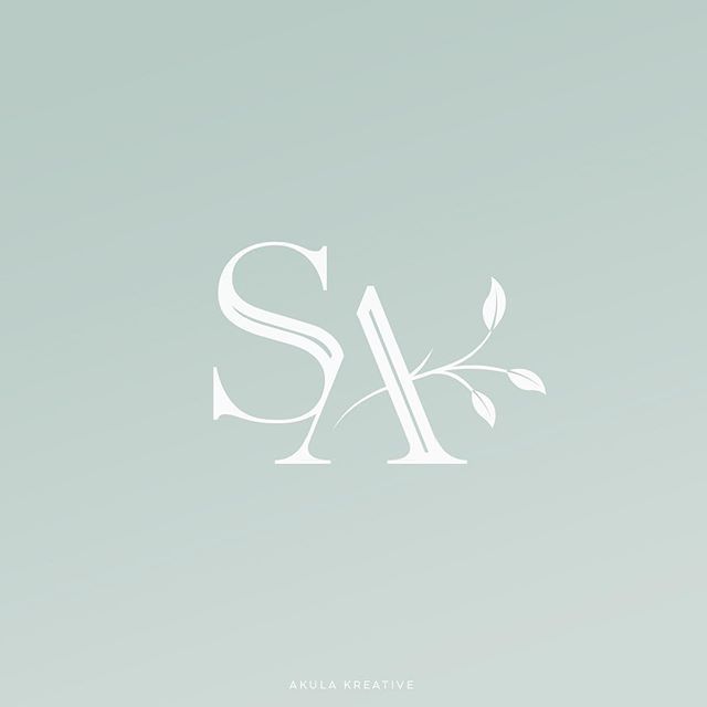 the letter s is made up of leaves and letters that are white on a light blue background