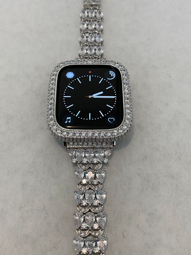 This Silver Apple Watch band or Apple Watch Case is compatible with all Apple Watch Series (2-9 SE), including 38mm, 40mm, 41mm, 42mm, 44mm, 45mm, and Ultra 49mm models. Products are designed by Iwatch Candy and made custom to our specifications. Add a touch of glamour and sophistication to your Apple Watch with our stunning jewelry style watch bands and apple watch cases. Perfect for everyday wear or special occasions, they feature sparkling high quality Swarovski Crystals or lab created diamon Apple Watch Cover, Apple Watch Band Women, Gold Apple Watch Band, Apple Watch Bands Women, Ceramic Apple, Apple Watch Fashion, Gold Apple Watch, Gold Apple, Iphone Watch