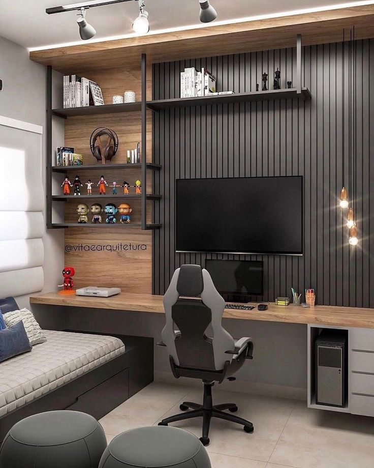 a room with a couch, desk and television in it