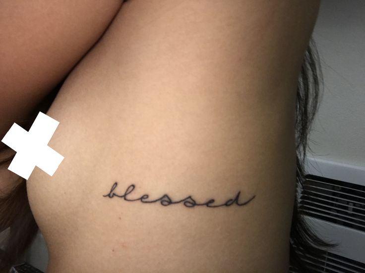 a woman's thigh with a tattoo that reads, besod on it