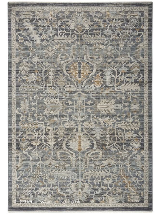 a gray and yellow rug with an ornate design