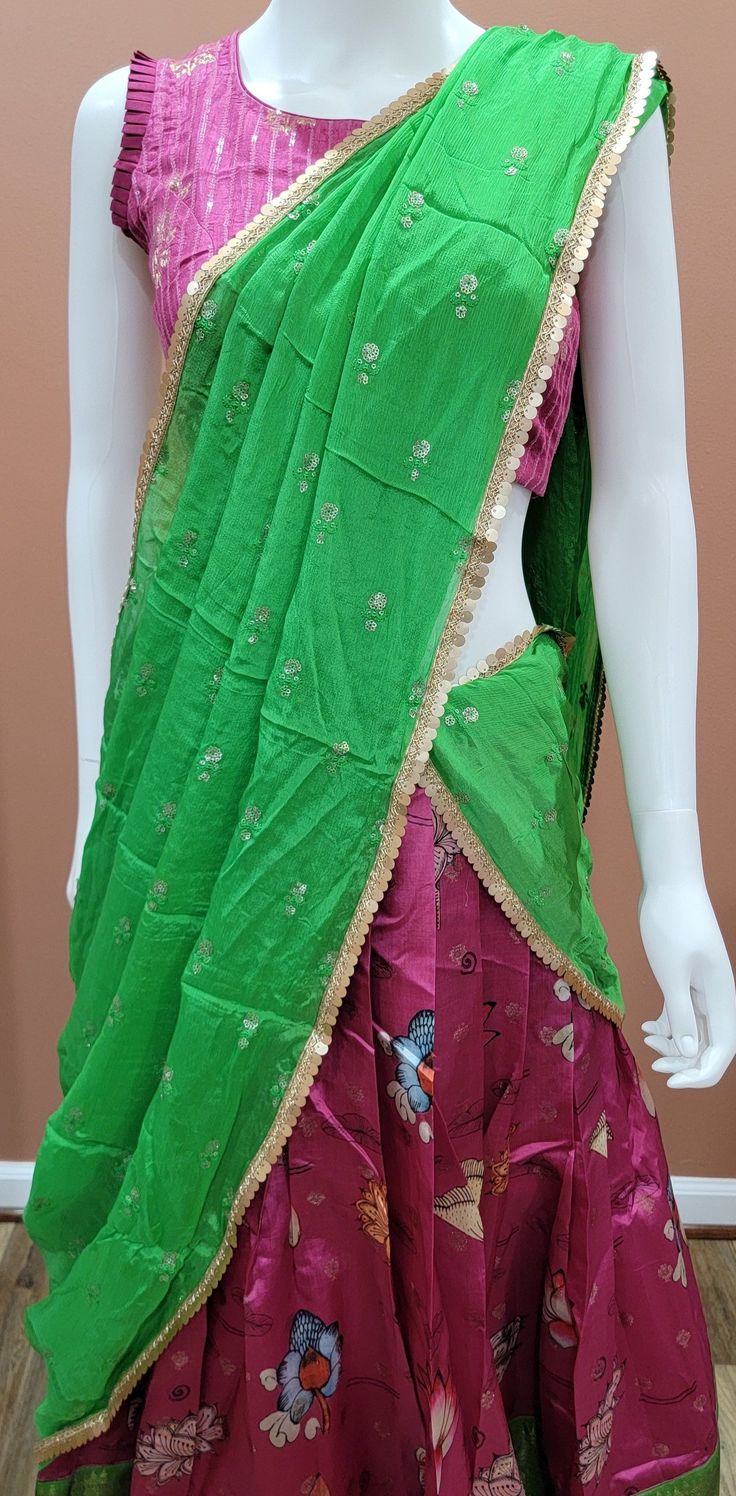 Elegant Banaras Digital Printed half saree set in Green and Pink Blouse size : 32 Inches Lehenga length: 39 inches Pista Green Art Silk Pre-draped Saree For Puja, Fitted Multicolor Dola Silk Pre-draped Saree, Multicolor Traditional Wear With Sheer Dupatta For Puja, Traditional Pista Green Pre-draped Saree With Sheer Dupatta, Semi-stitched Multicolor Pre-draped Saree In Chinon, Green Chinon Pre-draped Saree For Navratri, Pista Green Pre-draped Saree With Cutdana For Diwali, Pista Green Cutdana Pre-draped Saree For Diwali, Bollywood Style Pista Green Pre-draped Saree For Festive Occasions