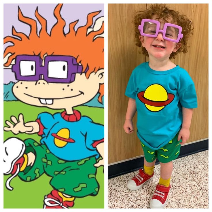 a little boy wearing glasses and standing next to an image of a cartoon character with red hair