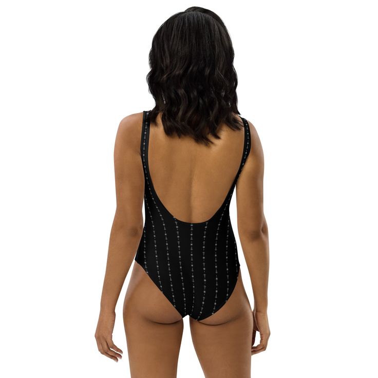 This one-piece swimsuit for all figures will bring out your best features. Enjoy the smooth fabric and the flattering design, and show it off by the sea or pool! • 82% Polyester, 18% Spandex • Fabric weight: 6.78 oz/yd² (230 g/m²), weight may vary by 5% • Chlorine-resistant fabric • Cheeky fit with a scoop neckline and a low scoop back • Zig-zag stitching • Double-layer front • Four-way stretch material stretches and recovers on the cross and lengthwise grainsSize guide CHEST (inches) WAIST (inc One-piece Lined Tankini For Sunbathing, Lined One-piece Tankini For Sunbathing, Black Beachwear Leotard For The Beach, Fitted Backless Swimwear For Swimming, Lined One-piece Swimwear For Beach, Lined One-piece Bodysuit For Poolside, Poolside One-piece Lined Bodysuit, Backless Lined Swimwear For Beachwear, Backless Lined Swimwear For Beach Season