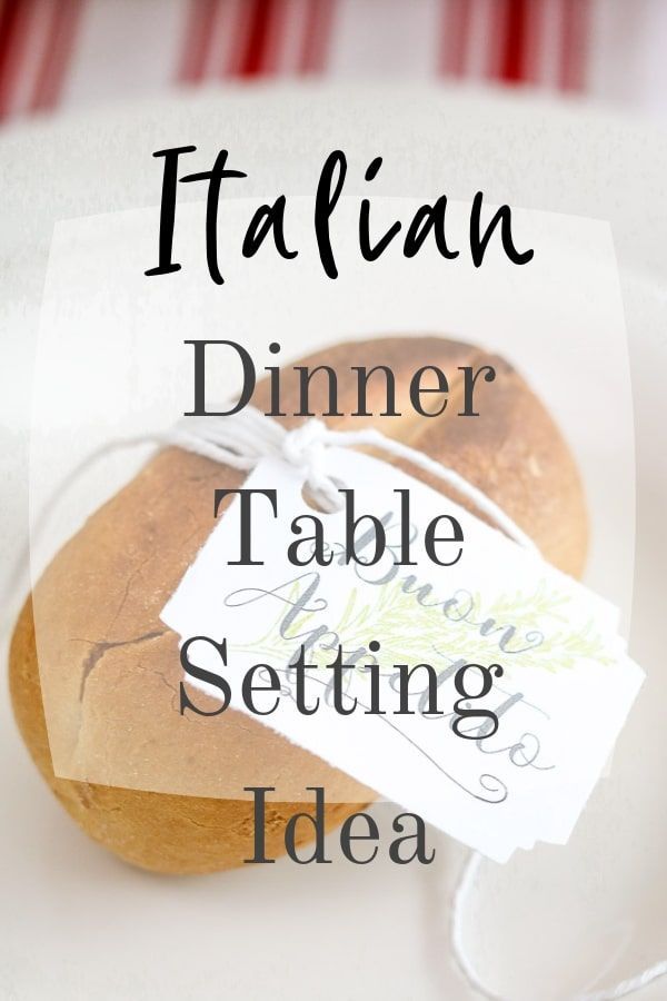 an italian dinner table setting idea on a white plate with a red and white checkered table cloth