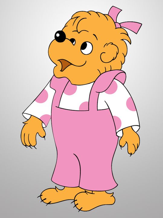 an image of a cartoon bear wearing pink overalls and polka dot print on it's shirt