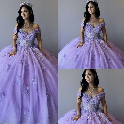 four pictures of a woman wearing a purple dress with flowers on the skirt and tiara