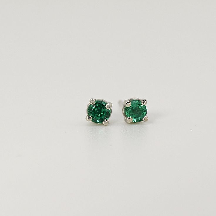 Looking for the perfect gift for a loved one or special occasion? These 14k yellow gold and emerald stud earrings are sure to impress and make an unforgettable present! Featuring stunning emeralds set in 14k yellow gold, these earrings are versatile and elegant, making them suitable for any occasion. Whether it's for a birthday, anniversary, or just a special surprise, these earrings are a timeless and luxurious gift that will be cherished for years to come. SOLD AS PAIR. Material; 14k solid gol Emerald Cut Green Sterling Silver Earrings, Green Diamond Earrings For Formal Occasions, Gift Green Diamond Earrings, Green Gemstone Diamond Earrings As Gift, Green Gemstone Diamond Earrings For Gift, Classic Green Sterling Silver Diamond Earrings, Green Round Diamond Earrings Fine Jewelry, Round Cut Emerald Earrings For Anniversary, Emerald Round Cut Earrings For Anniversary