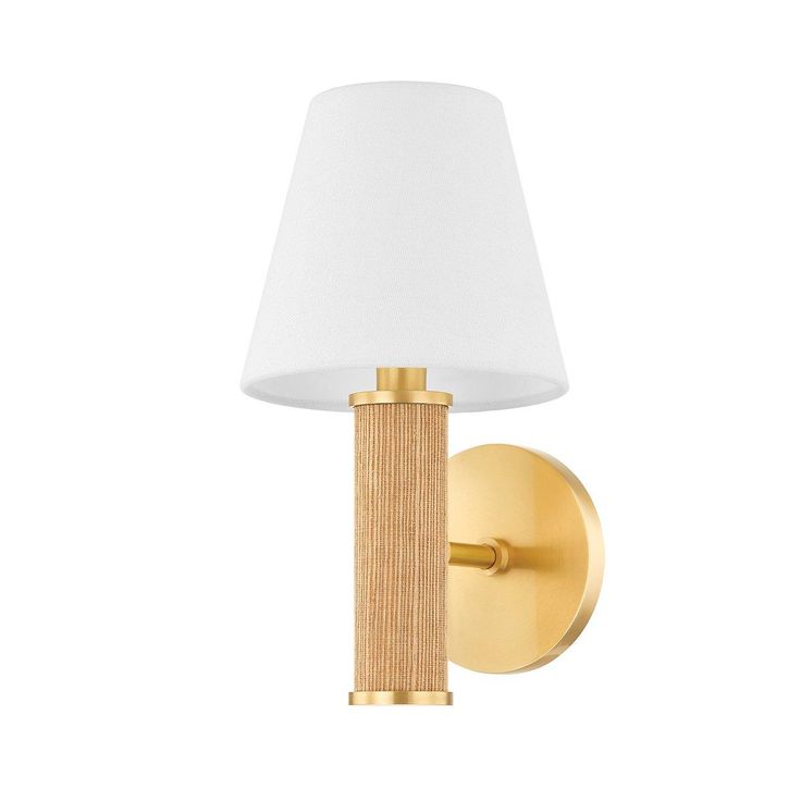 a wall light with a white shade on it