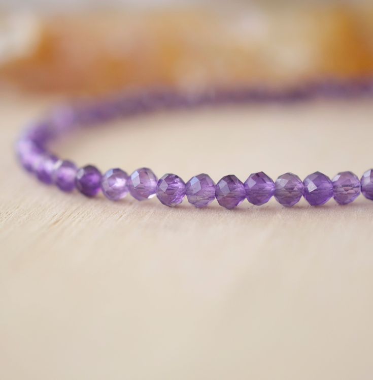 Wrap yourself in sparkle with this faceted Amethyst bracelet! Amethyst, the purple variety of Quartz, is said to encourage selflessness and spiritual wisdom, while improving motivation. It is a meditative gem that aids in providing a sense of calm, balance, and peace--who wouldn't want to tap into that goodness? Our bracelet is handmade in sterling silver or 14k gold filled with natural, micro-faceted Amethyst for extra sparkle! GEMSTONE: Natural Purple Amethyst STONE SIZE: 3mm (.1") SIZING: Ple Purple Amethyst Faceted Beaded Bracelets, Purple Faceted Amethyst Beaded Bracelets, Faceted Purple Amethyst Beaded Bracelets, Spiritual Purple Faceted Beaded Bracelets, Spiritual Faceted Purple Beaded Bracelets, Faceted Purple Beaded Bracelets, Purple Faceted Spiritual Bracelets, Spiritual Purple Faceted Bracelets, Spiritual Faceted Purple Bracelets