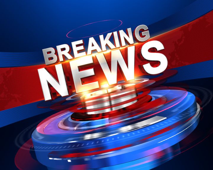 the breaking news logo is displayed on a blue and red background with an orange light