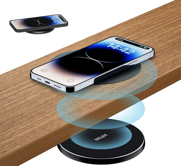 an iphone is charging on a wooden dock