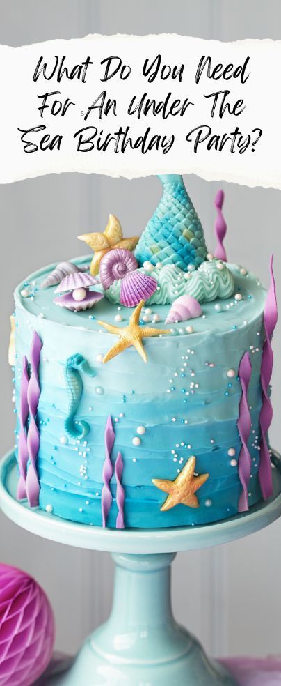 a birthday cake with blue frosting and sea animals on it, under the words what do you need for an under the sea birthday party?