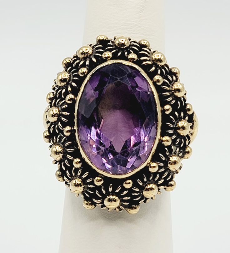 14K Yellow Gold Purple Amethyst Edwardian Style Cocktail Ring Size 6.5 A perfect gift for your loved one for any special occasion or holiday! Total Ring Weight: 13.32g Ring Length: 27.92mm Ring Width: 25.11mm Gemstone: Purple Amethyst Item will be placed into a gift box. * Collectible Gold Amethyst Ring With Center Stone, Fine Jewelry Amethyst Ring Stamped 14k As Gift, Gold Amethyst Ring Stamped 14k, Gold Amethyst Ring With Center Stone As Collectible, Fine Jewelry Amethyst Ring Stamped 14k For Gift, Fine Jewelry 14k Stamped Amethyst Ring Gift, Yellow Gold Amethyst Ring With Accent Stones As Gift, 14k Stamped Amethyst Ring For Gift, Victorian Style Amethyst Ring Stamped 14k