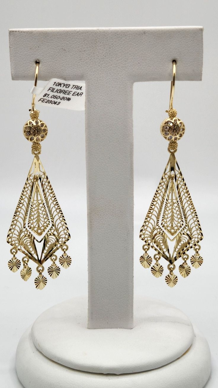 10K Gold Filigree earrings! Beautiful detailing around entire earring. Diamond cut for extra shine and brilliance. Perfect for anniversaries, weddings, night on the town and everyday wear!  Light weight and will not weigh down your ear. Traditional 14k Gold Pierced Jewelry, 14k Yellow Gold Pierced Diamond Earrings, Traditional 14k Gold Drop Earrings, Classic Gold Diamond Drop Earrings, Traditional Gold Diamond Cut Earrings, Yellow Gold Drop Earrings For Bridal Celebration, Yellow Gold Hallmarked Danglers For Wedding, Elegant Gold Diamond Cut Earrings, Luxury Drop Chandelier Earrings With Intricate Design