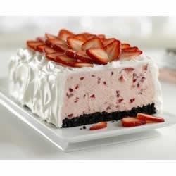 a piece of cake with strawberries on top