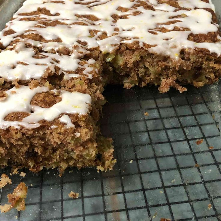 a close up of a cake on a cooling rack